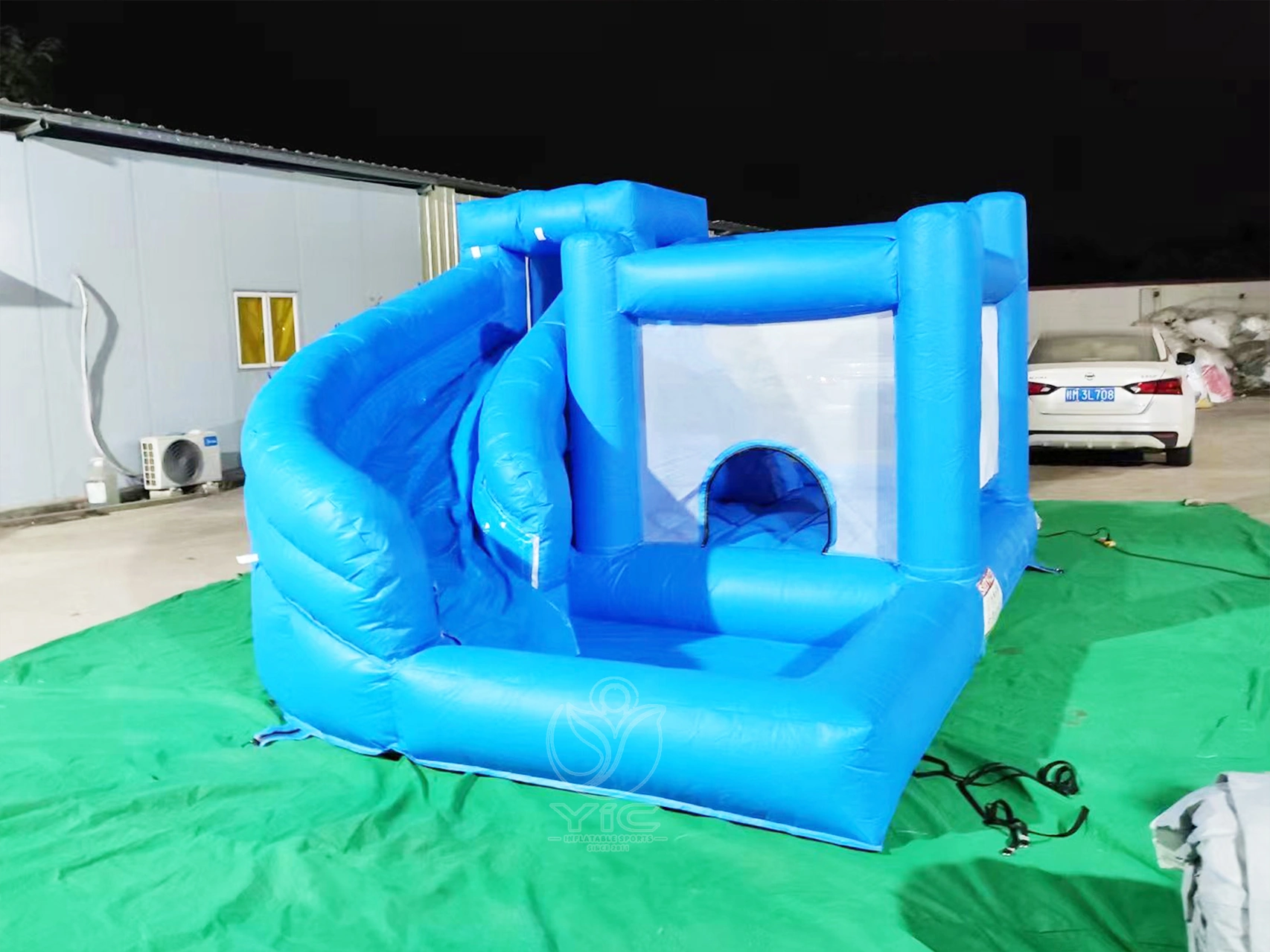 Blue bounce house with ball pit