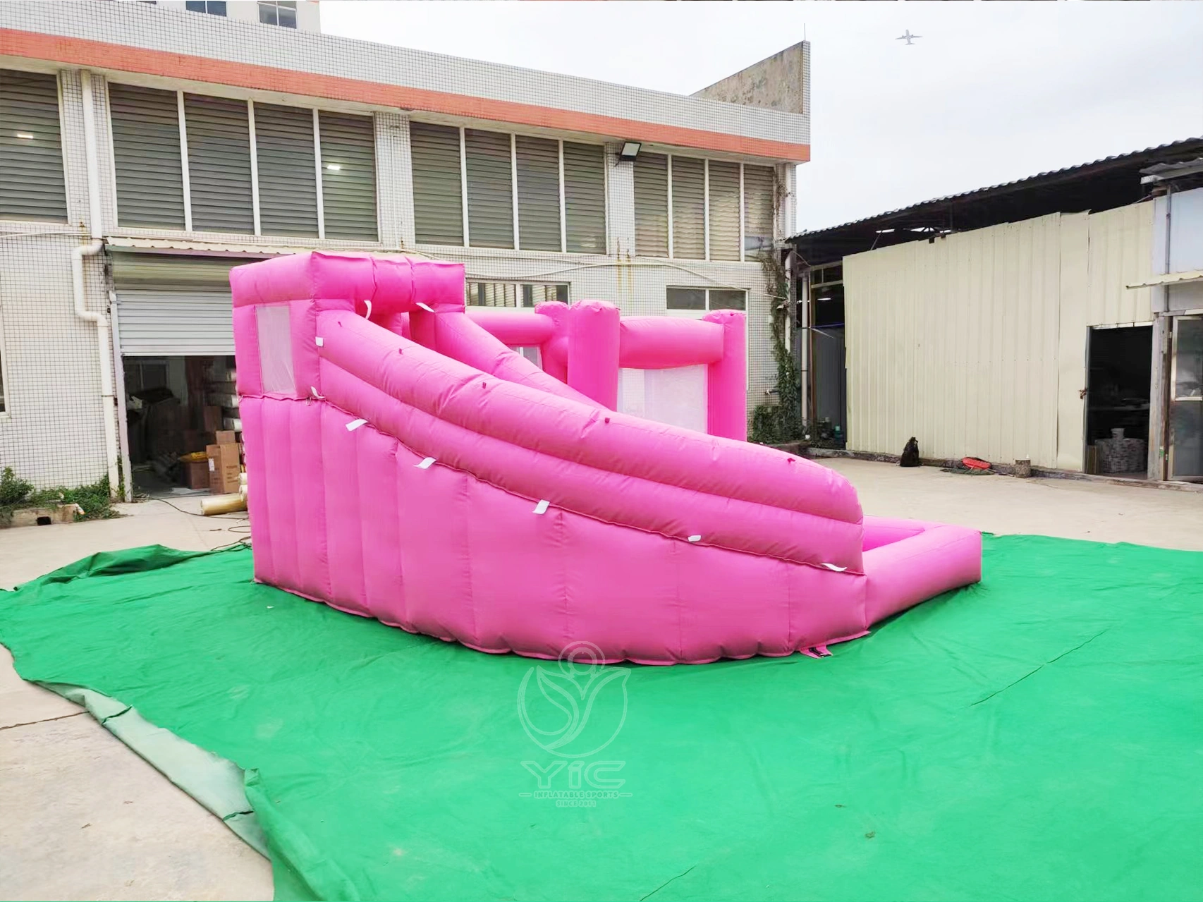 Pink bounce house with slide and ball pit product photo 3