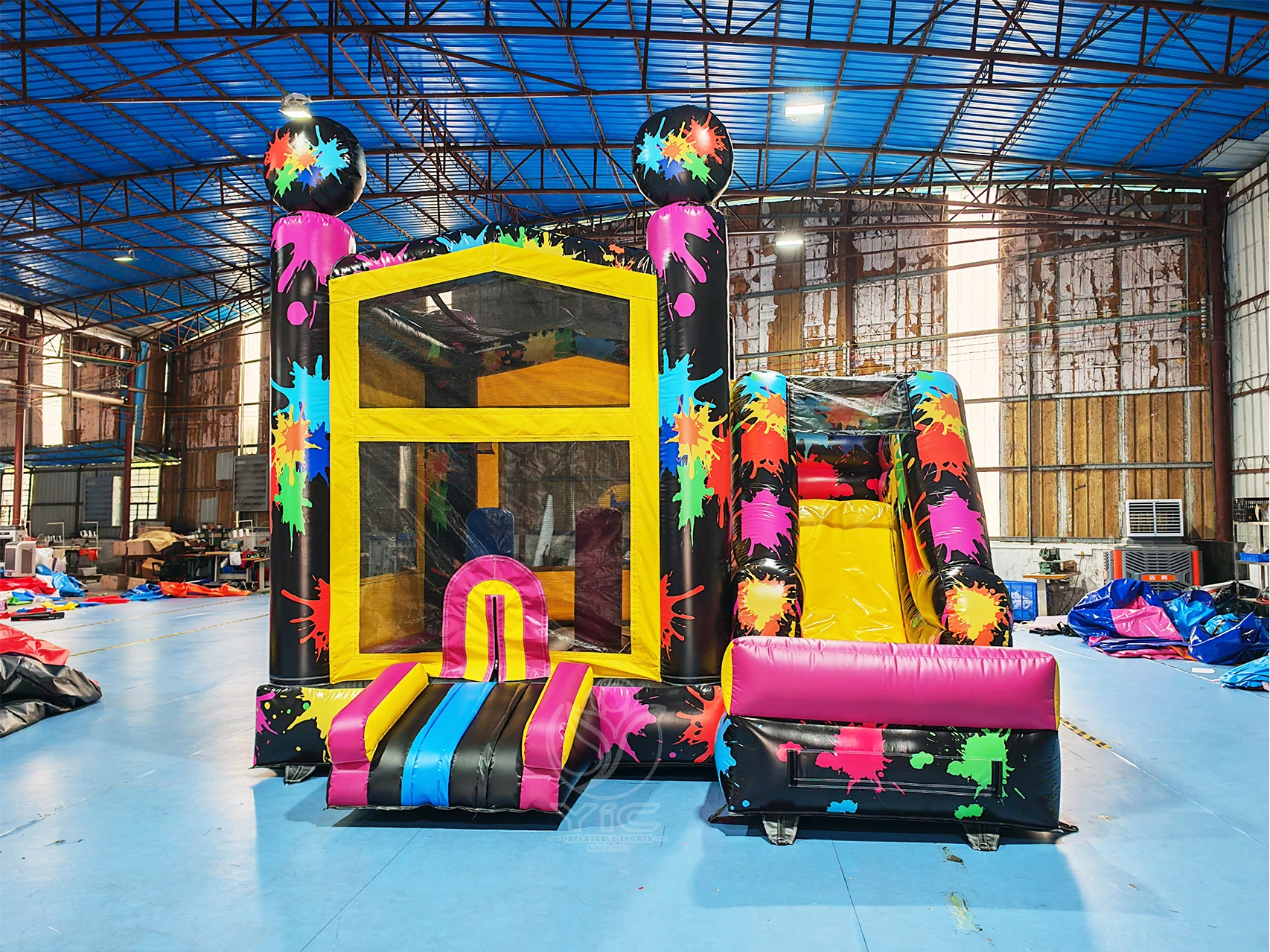 Paint splatter bounce house combo