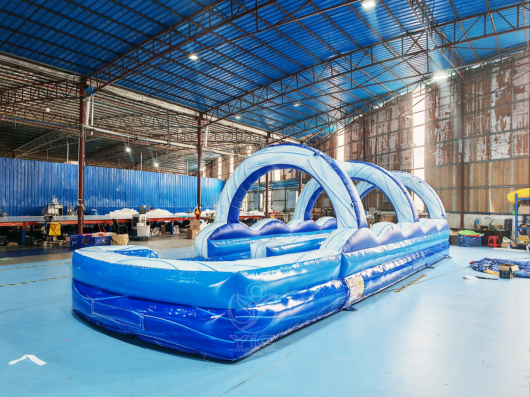 Inflatable slip and slide with pool